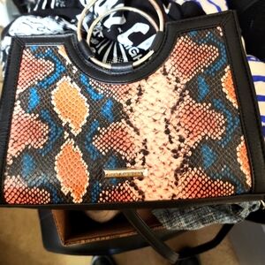 Enzo Angilolini purse.